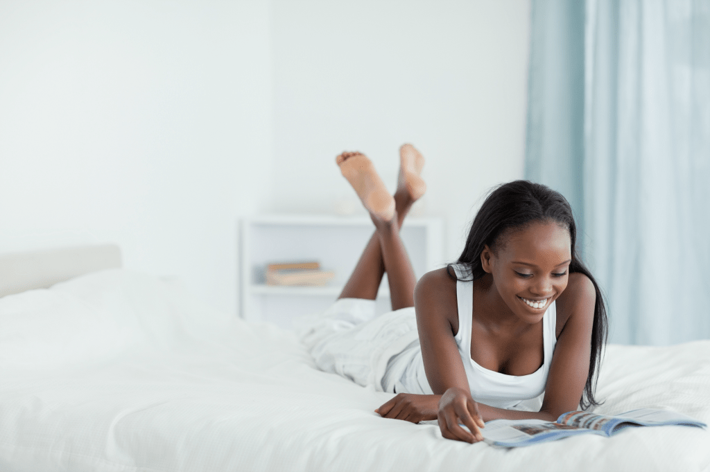 Woman Laying in Bed