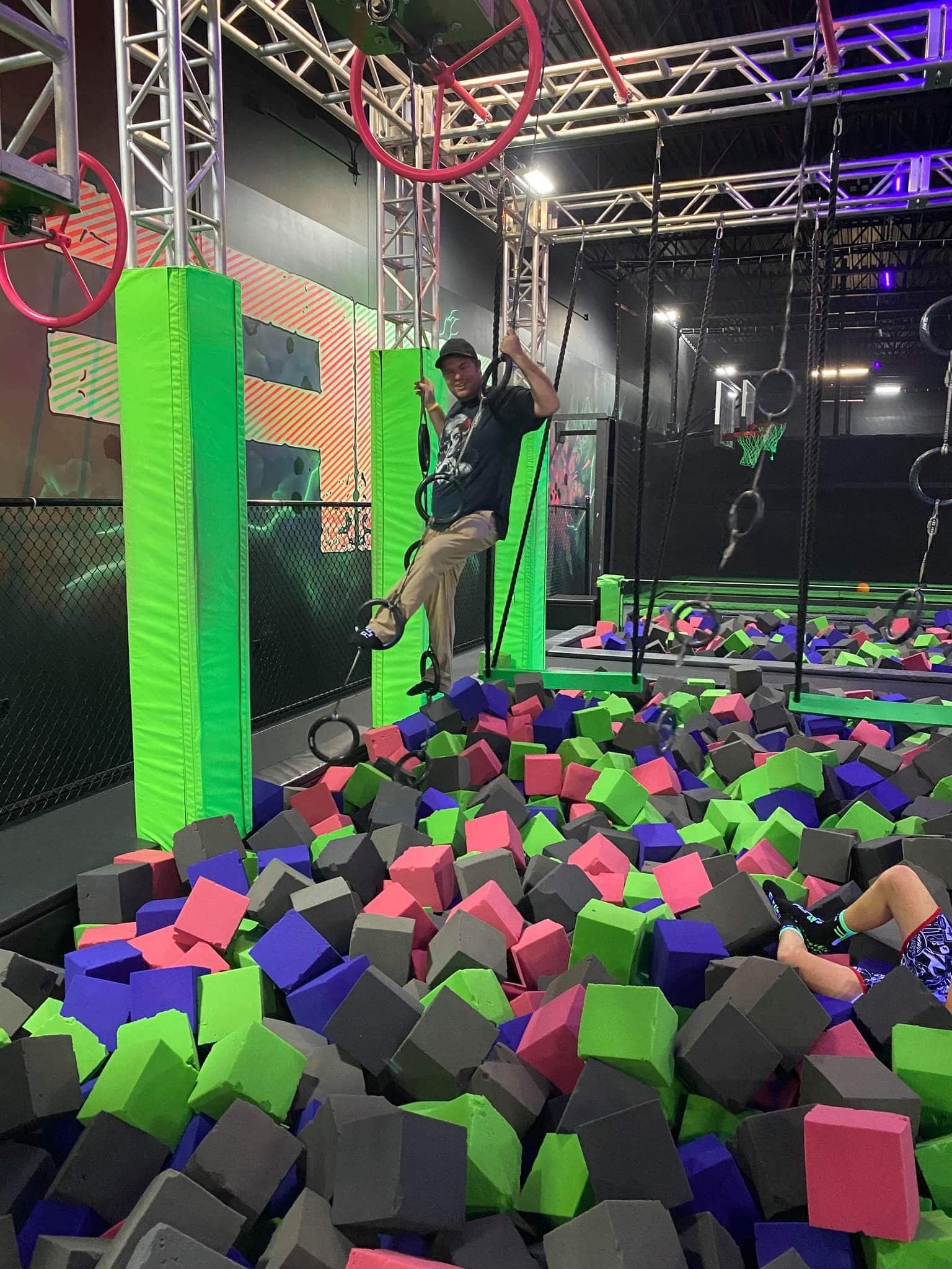 Man Playing in Foam Pit